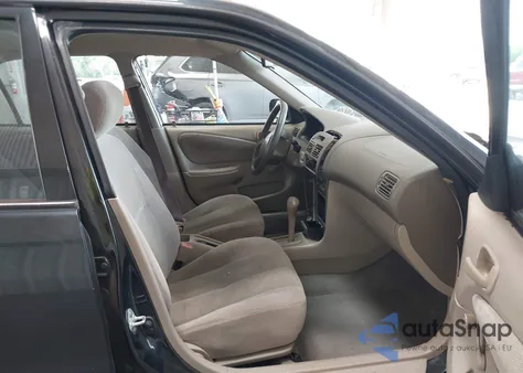 2002 Toyota Corolla Ce из США, поврежденный, VIN 1NXBR12E22Z628226